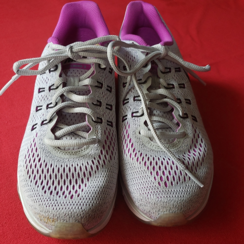 Gray and purple Nike shoes